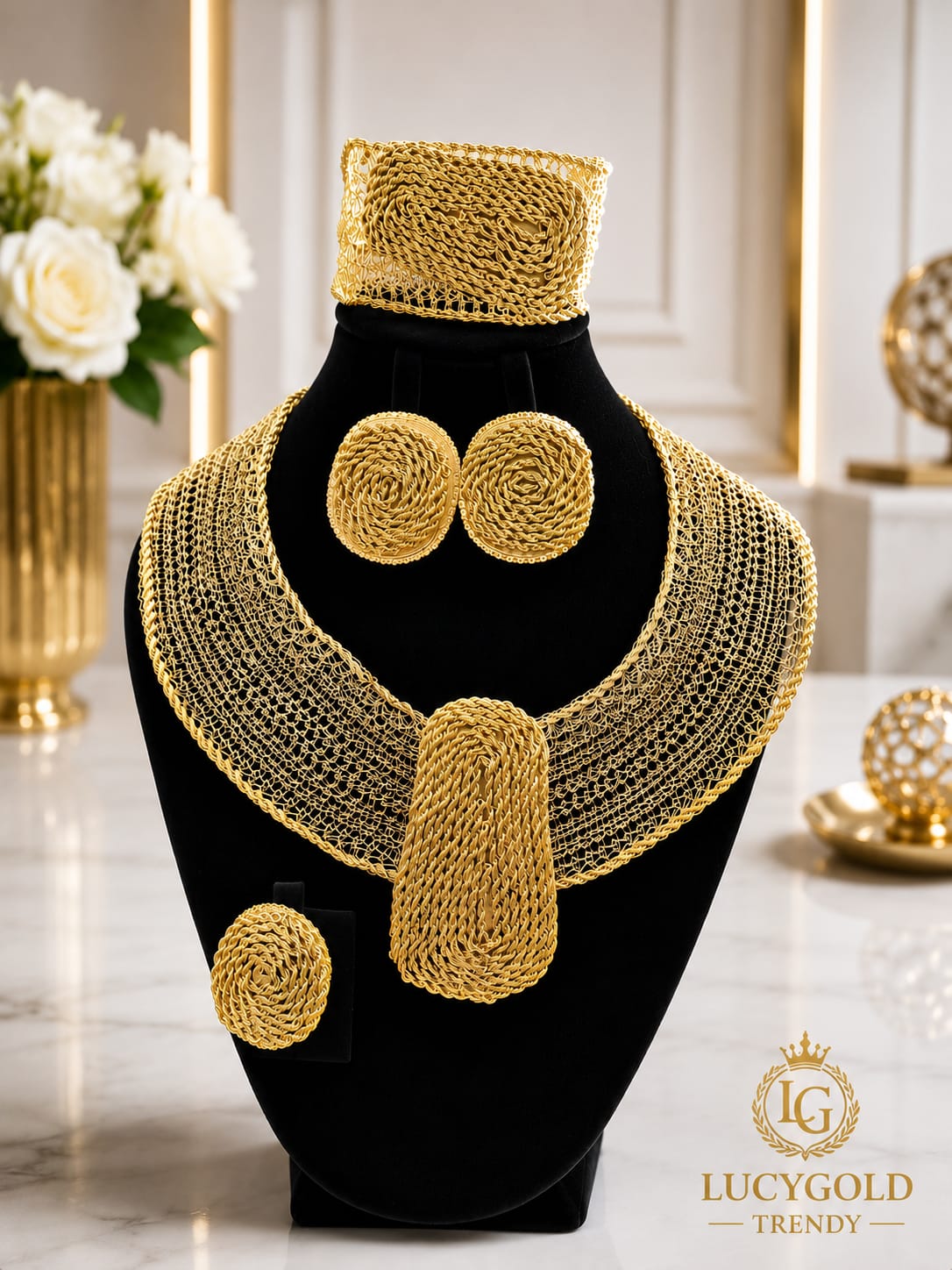 Gold woven mesh collar necklace with matching cuff bracelet and swirl earrings