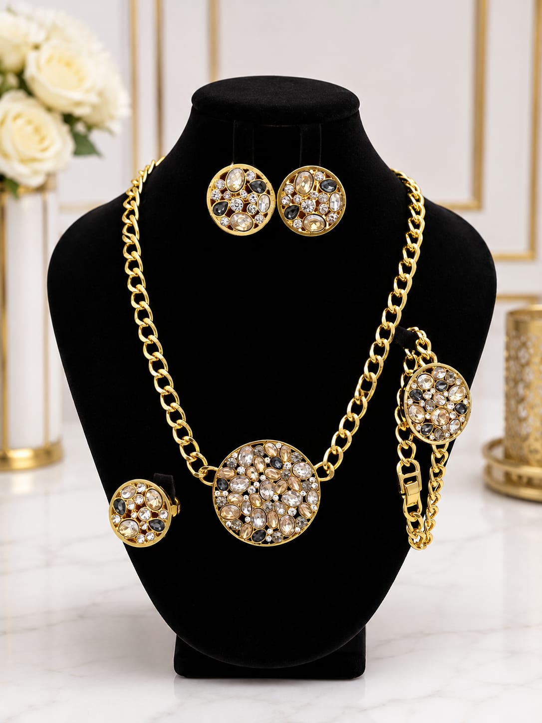 Gold curb chain necklace set with champagne and black crystal clusters, bracelet, earrings and ring
