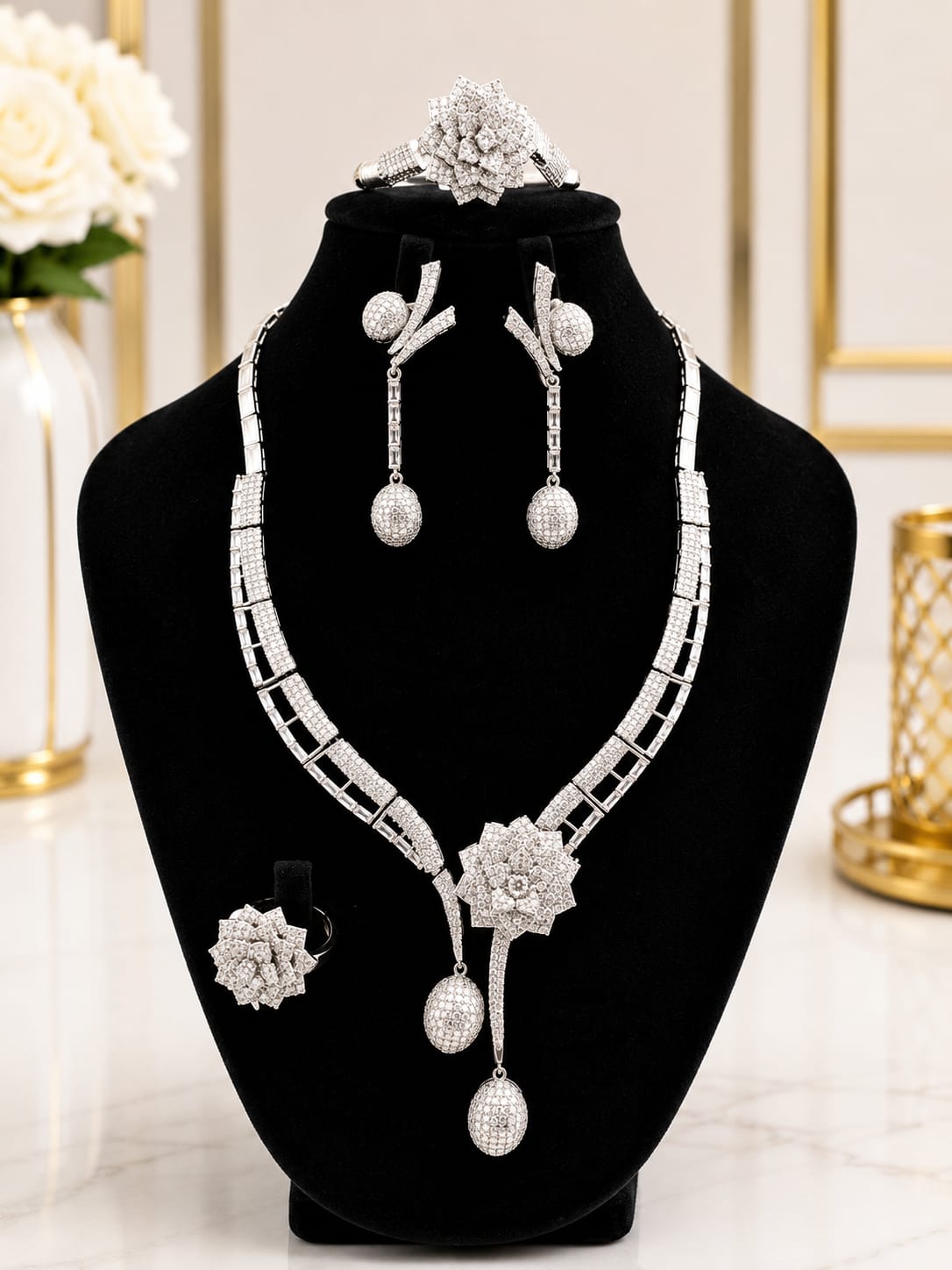 Silver crystal Y-necklace with rose centerpiece and pear drops, matching bracelet, earrings and ring