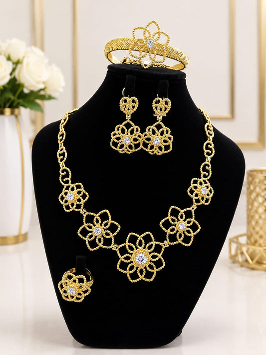 Gold filigree flower necklace set with crystal centers, earrings, bangle and ring