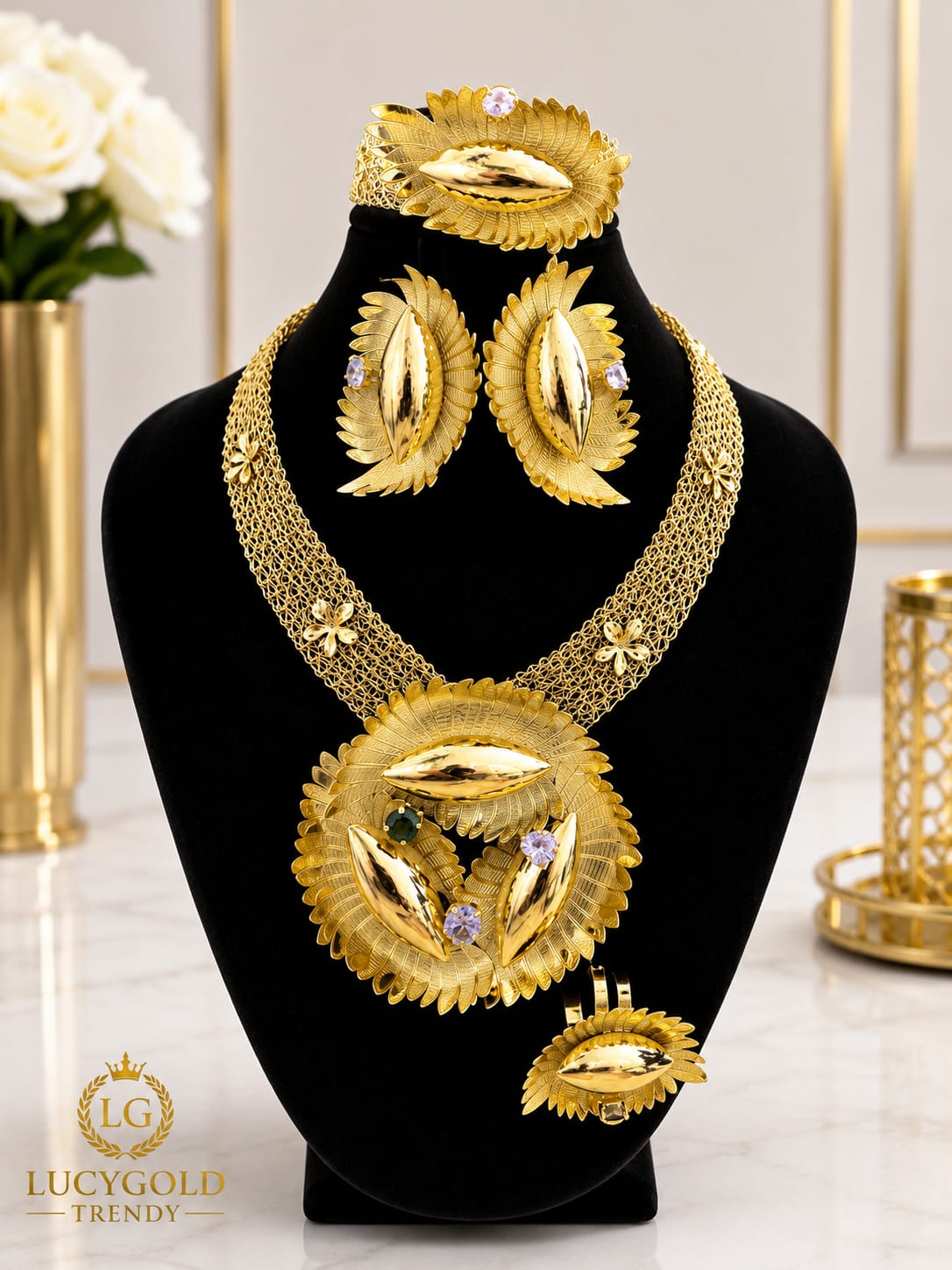 Gold sunburst leaf necklace set with lavender crystal accents, earrings, bracelet and ring
