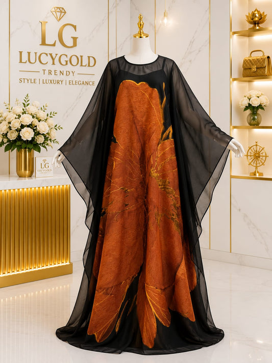 Black kaftan with burnt amber and gold leaf print and sheer flowing sleeves
